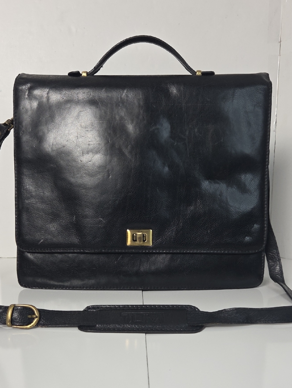 Tumi Full Grain Leather Briefcase Bag in Black With Gold Accent Turnlock